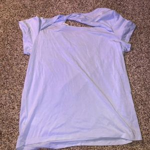 light blue open back shirt